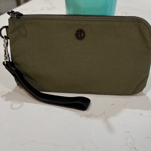 lululemon athletica Handbags - lululemon athletica Olive Wristlet Clutch with Black Strap